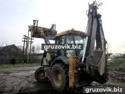 Экскаватор-погрузчик John Deere 325J 2011 года новый фото 4