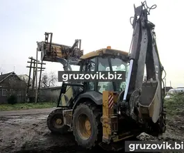 Экскаватор-погрузчик John Deere 325J 2011 года новый фото 4