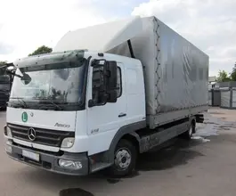 Тентованный грузовик Тентованный грузовик  Mercedes-Benz 2010 года б/у фото 3
